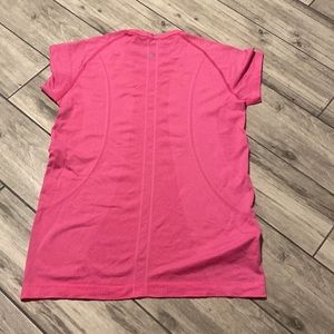 Bright pink lululemon shirt